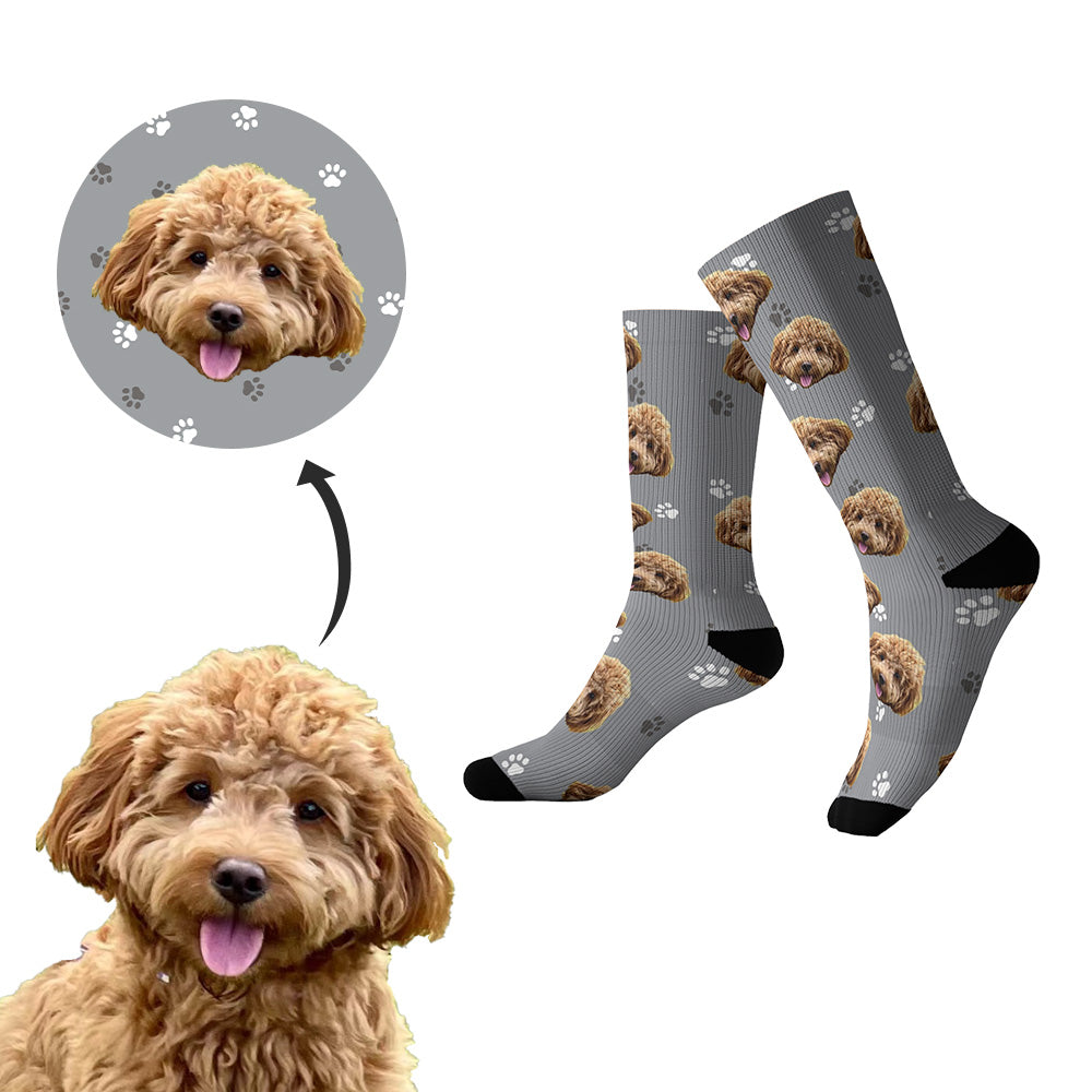 Custom socks with a printed image of a light brown dog, showcasing the socks' design featuring the dog's face and paws.