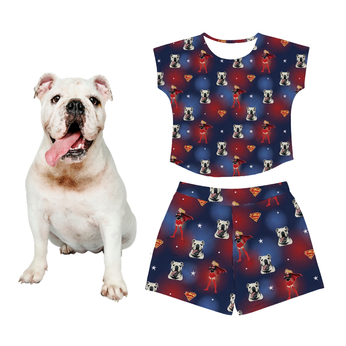 Dog wearing a matching superhero-themed shirt and shorts set on a white background