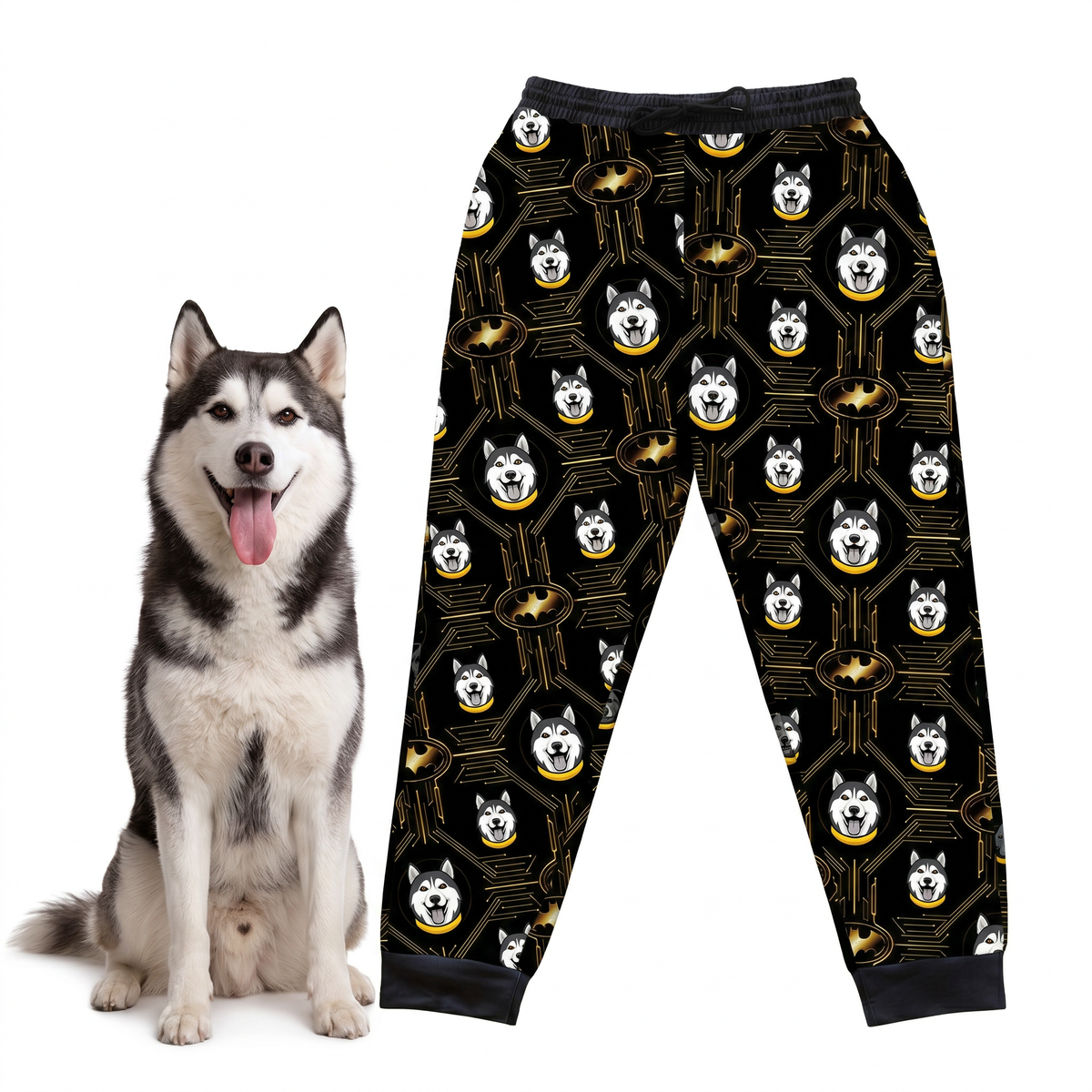 Pajama pants with dog pattern next to a real dog on a white background