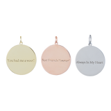 Three round charms: 'You had me at woof?', 'Best Friends', and 'Always In My Heart'.