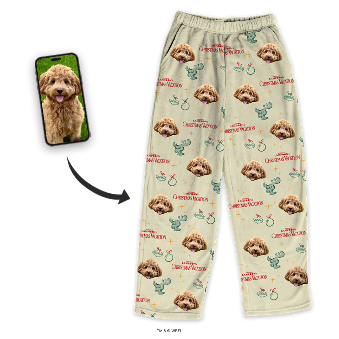 Beige pajama pants with a repeating dog's face and green moose mug pattern and red 