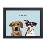 A custom illustrated memorial portrait of two pets, displayed in a black frame with the names Lyla & Spike. IceBlue12"x16"GalleryPaperFrameBlack