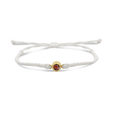 White braided bracelets with a black bead charm in gold color