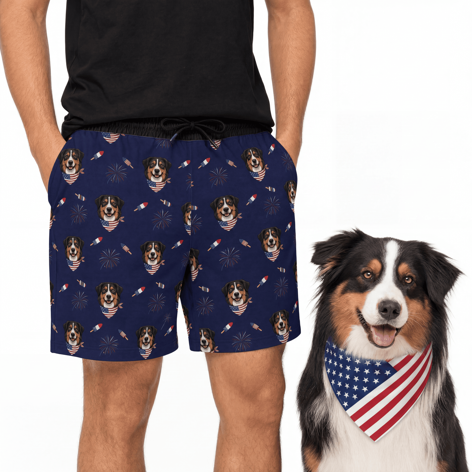 Person wearing navy shorts with dog pattern, next to a dog wearing an American flag bandana[Fireworks]