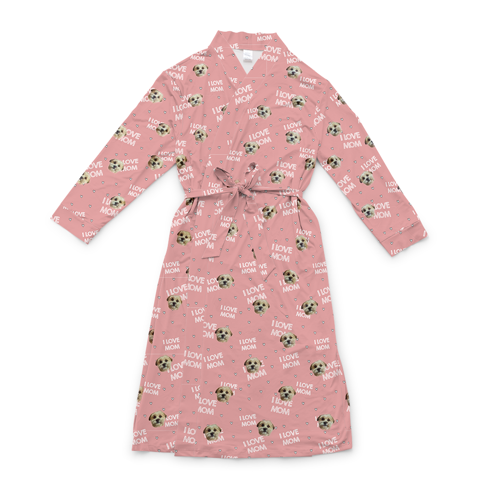 Pink robe with a waist tie and an all-over print of small dog faces, shown on a white background