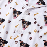 This is a close-up of the Paws and Bones print fabric on a button-down pajama shirt covered in repeating pet faces[PawsandBonesPajamaFabricCloseUp]