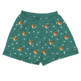 These are pajama shorts in a Green Paws print with repeating pet faces on them[GreenPawsPajamaShorts]