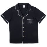 Premium women’s bamboo pajama short sleeve shirt with buttons in black. Custom pet portrait on the chest pocket