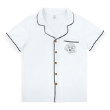 Premium women’s bamboo pajama short sleeve shirt with buttons in ivory. Custom pet portrait on the chest pocket