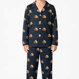 Black pajama set with dog pattern on a white background