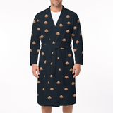 Man wearing black robe covered in repeating golden doodle dog face pattern, tied at waist, knee length