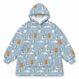 A light blue hooded sweatshirt with a festive winter print featuring cartoon polar bears, snowman, Christmas trees, and orange cats, displayed on a clean white background.