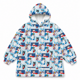 A hooded jacket with a repeating cartoon dog collage print in blue, white, black, and red, shown on a plain white background.