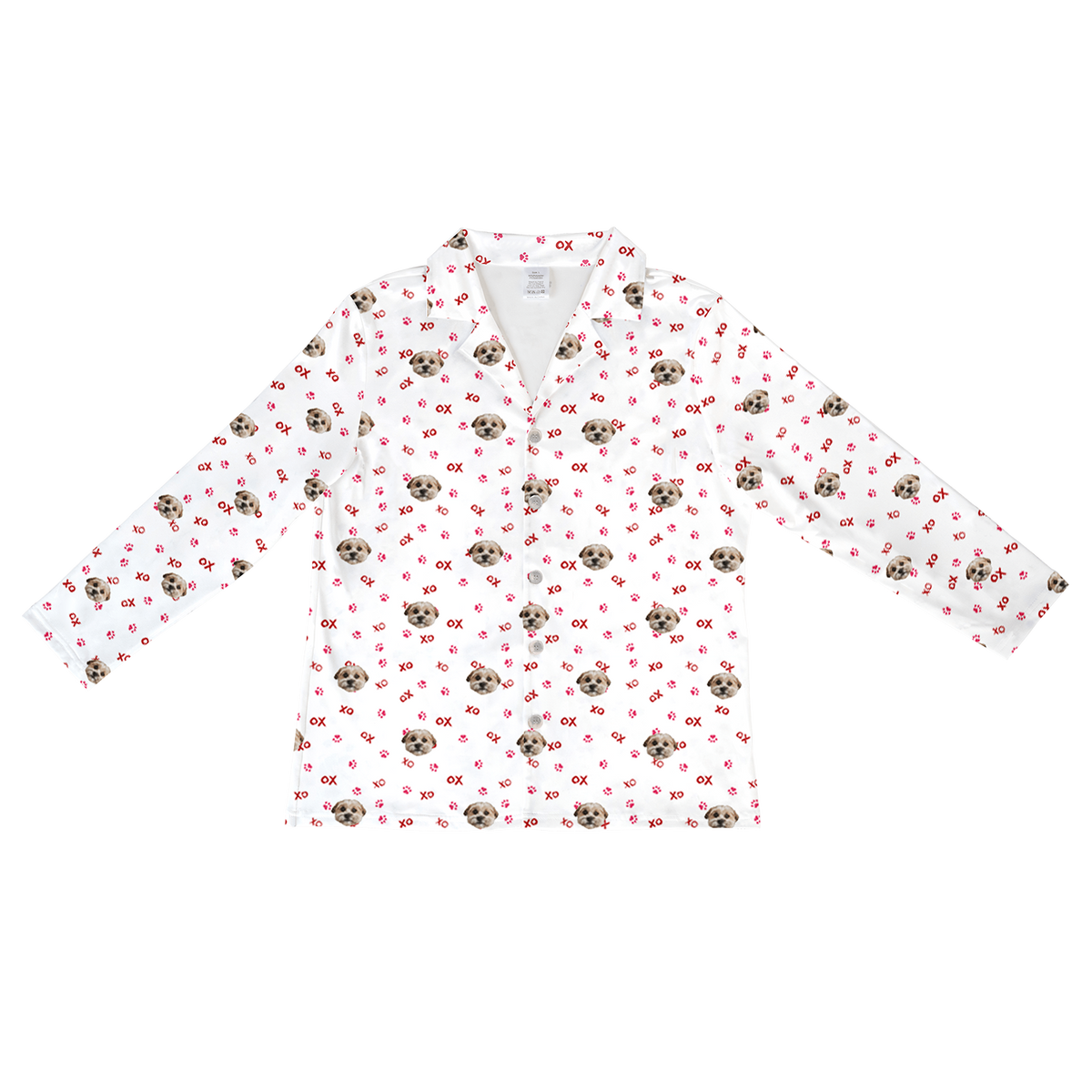 
A white, long-sleeve, button-down pajama top featuring a repeating pattern of a single light brown dog's face. The pattern also includes small pink "XO" text and scattered pink paw prints.