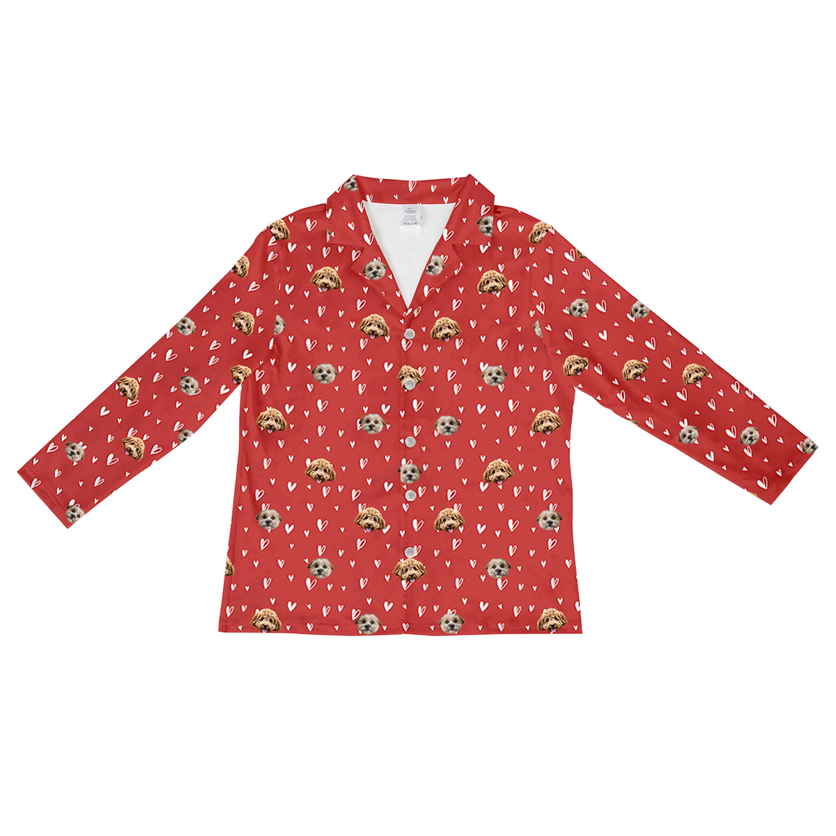 A single long-sleeve, button-down pajama shirt in a vibrant red color. The fabric has an all-over pattern of scattered white line-art and solid hearts. Overlaid on this pattern are repeating, cropped dog faces, featuring two different dog types.