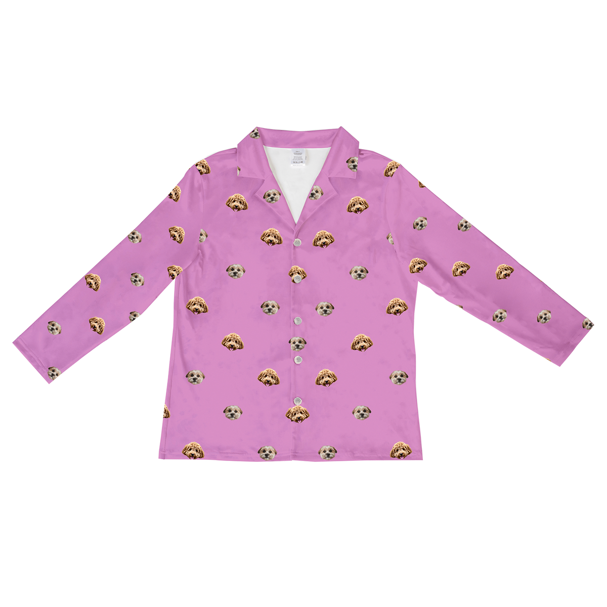 An orchid pink, long-sleeve, button-down pajama top featuring a scattered, repeating pattern of two different dog faces: one with light-colored, fluffy fur and another with brown, curly fur.
