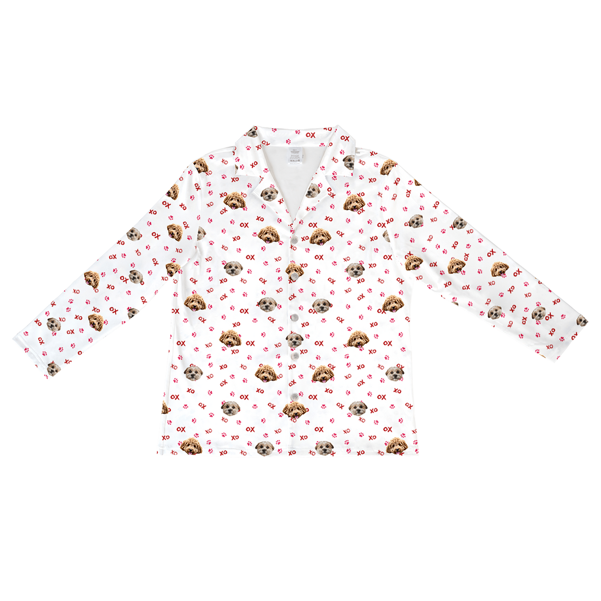 A white, long-sleeve, button-down pajama top featuring a repeating pattern of two different dog faces. The pattern also includes small pink "XO" text and scattered pink paw prints.
