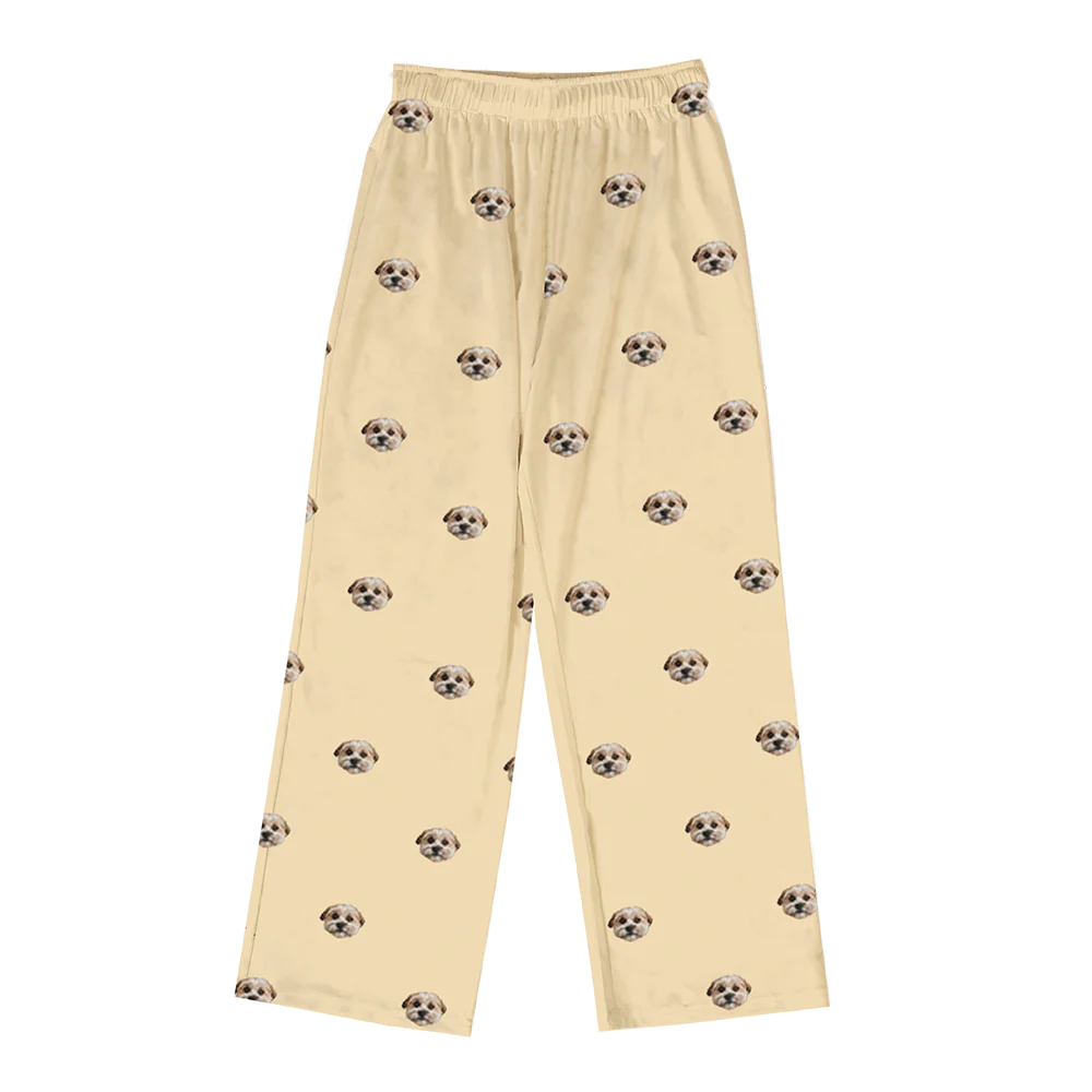 These are pajama pants in a yellow color with repeating pet faces on them[PajamaPants($53.00)]