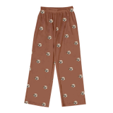 These are pajama pants in a cocoa color with repeating pet faces on them[CocoaPajamaPants]