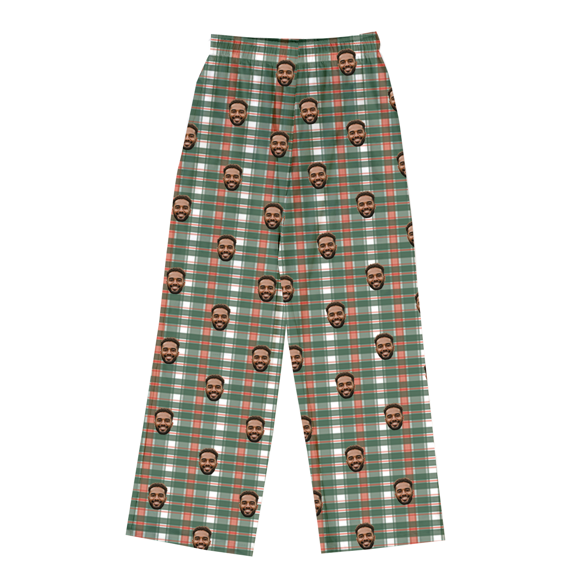 A pair of full-length pajama pants in a festive plaid pattern of green, white, and orange/red. The pattern is customized with multiple small, repeating images of a man's smiling face with a beard, covering the entire fabric.