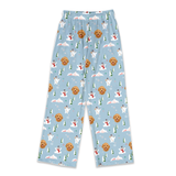 Light blue pajama pants with an all-over Christmas print featuring Golden Retriever dogs, snowmen, evergreen trees, and snowy mountains.