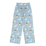 Light blue pajama pants with an all-over Christmas dog print, featuring cartoon dogs, snowmen, pine trees, and snowflakes on a white background.