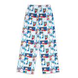A pair of children's pajama pants featuring a repeating cartoon print of polar bears in winter outfits on a white background.