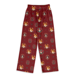 A pair of dark red lounge pants with an all-over repeating print of golden retriever dog faces in circular frames, set against a plain white background.