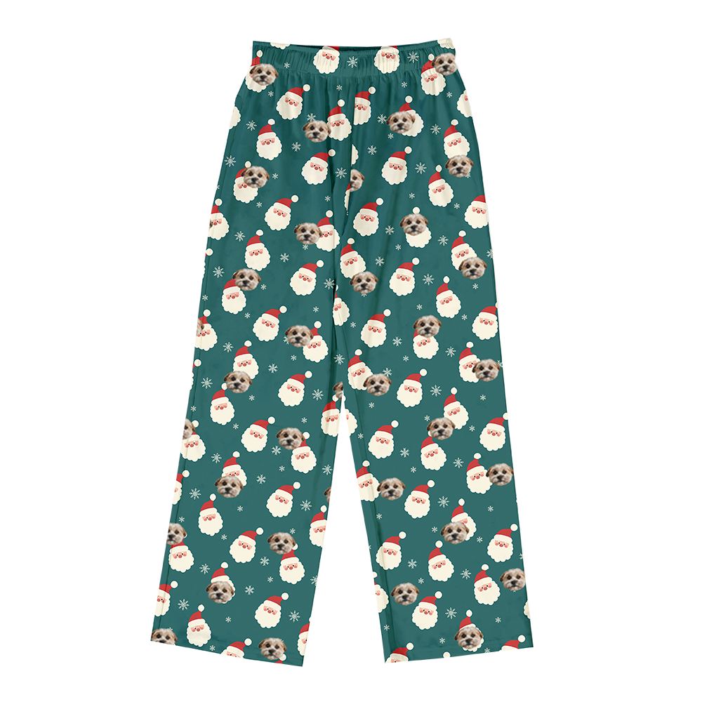 Teal pajama pants with Christmas-themed dog pattern on a white background