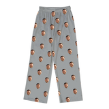 Light gray pajama pants with all-over small prints of a bearded man’s smiling face throughout[SlateGrayPajamaPants]