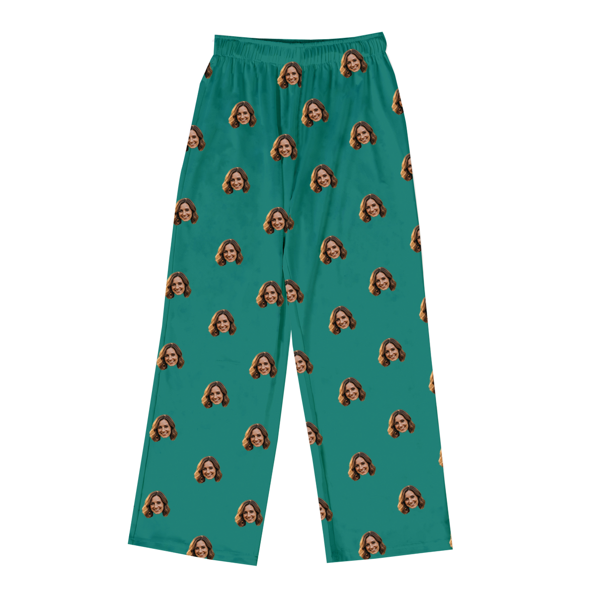 Teal green pajama pants decorated with a repeating pattern of the same smiling woman’s face across the fabric.
