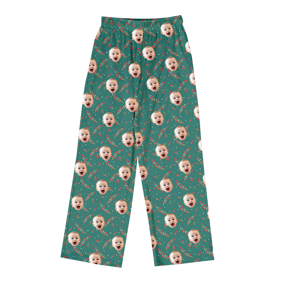 Teal pajama pants with an all-over festive print featuring a repeating pattern of a baby’s excited face and scattered holiday berry sprigs.