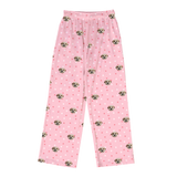 These are pajama pants in a pink color with repeating pet faces on them[PajamaPants]