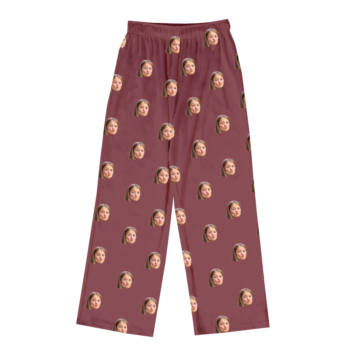 Maroon pajama pants featuring a repeating pattern of the same woman’s face printed across the fabric.