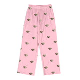 Pink pajama pants with dog pattern on a white background