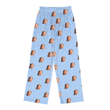 Light blue pajama pants with stars and repeating prints of a woman’s kissy face[SnowflakesPajamaPants]