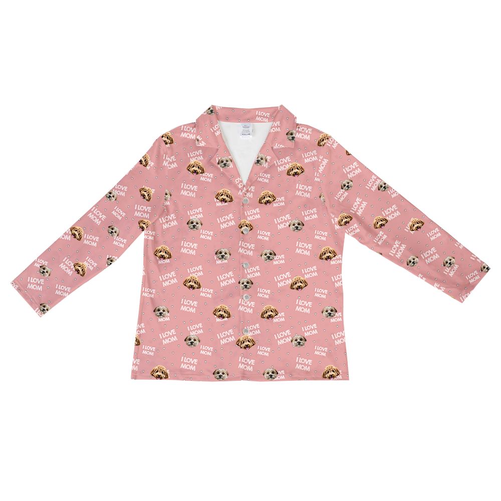 Pink long-sleeve pajama top featuring a repeating pattern of two different dog faces, small hearts, and the phrase “I LOVE MOM” throughout.