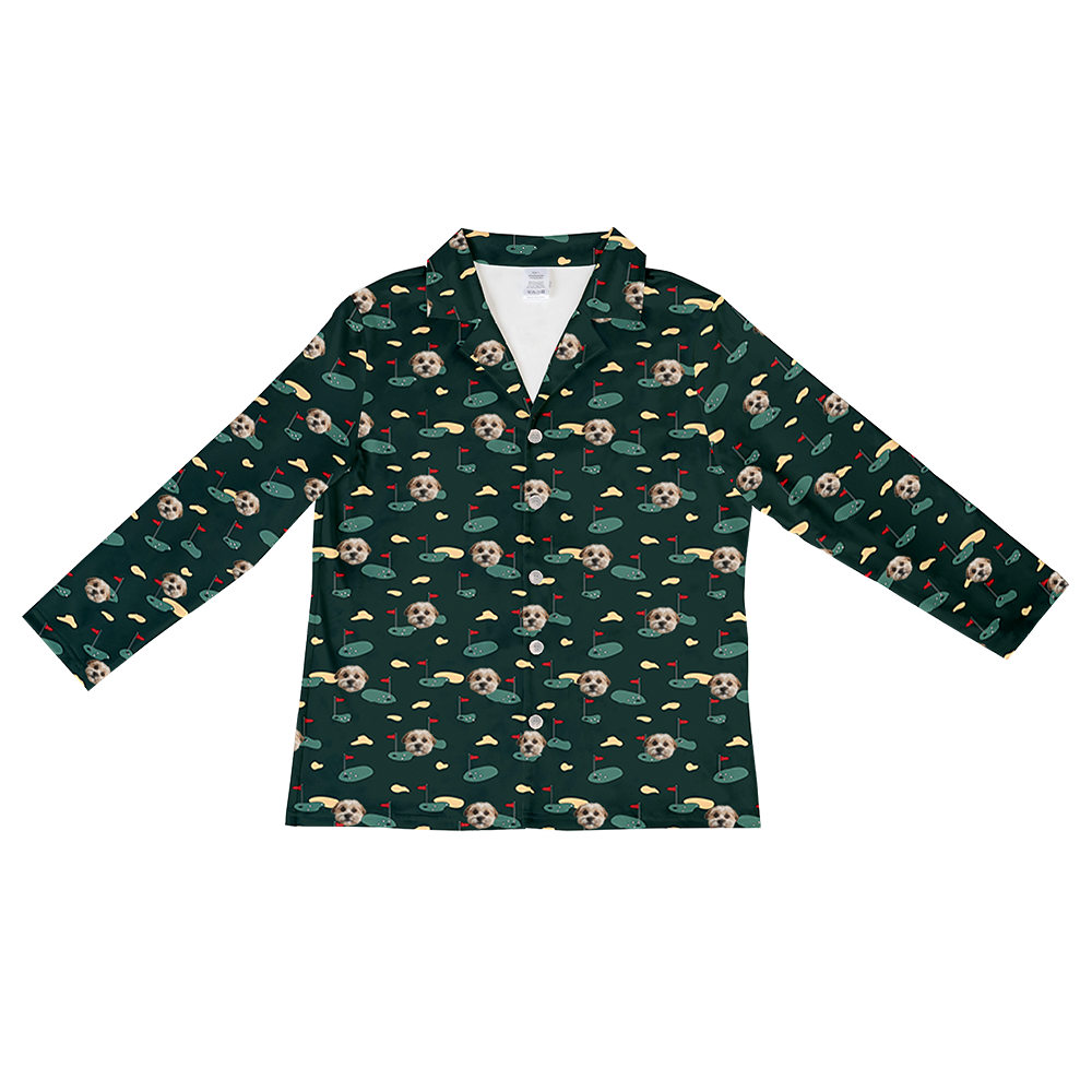 Dark green long-sleeve button-down pajama top with an all-over golf-themed pattern, featuring dog faces, golf flags, and greens.