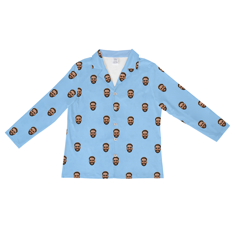 Long-sleeved, button-down pajama shirt in a solid sky blue color, featuring a repeating pattern of a bearded man's smiling face.