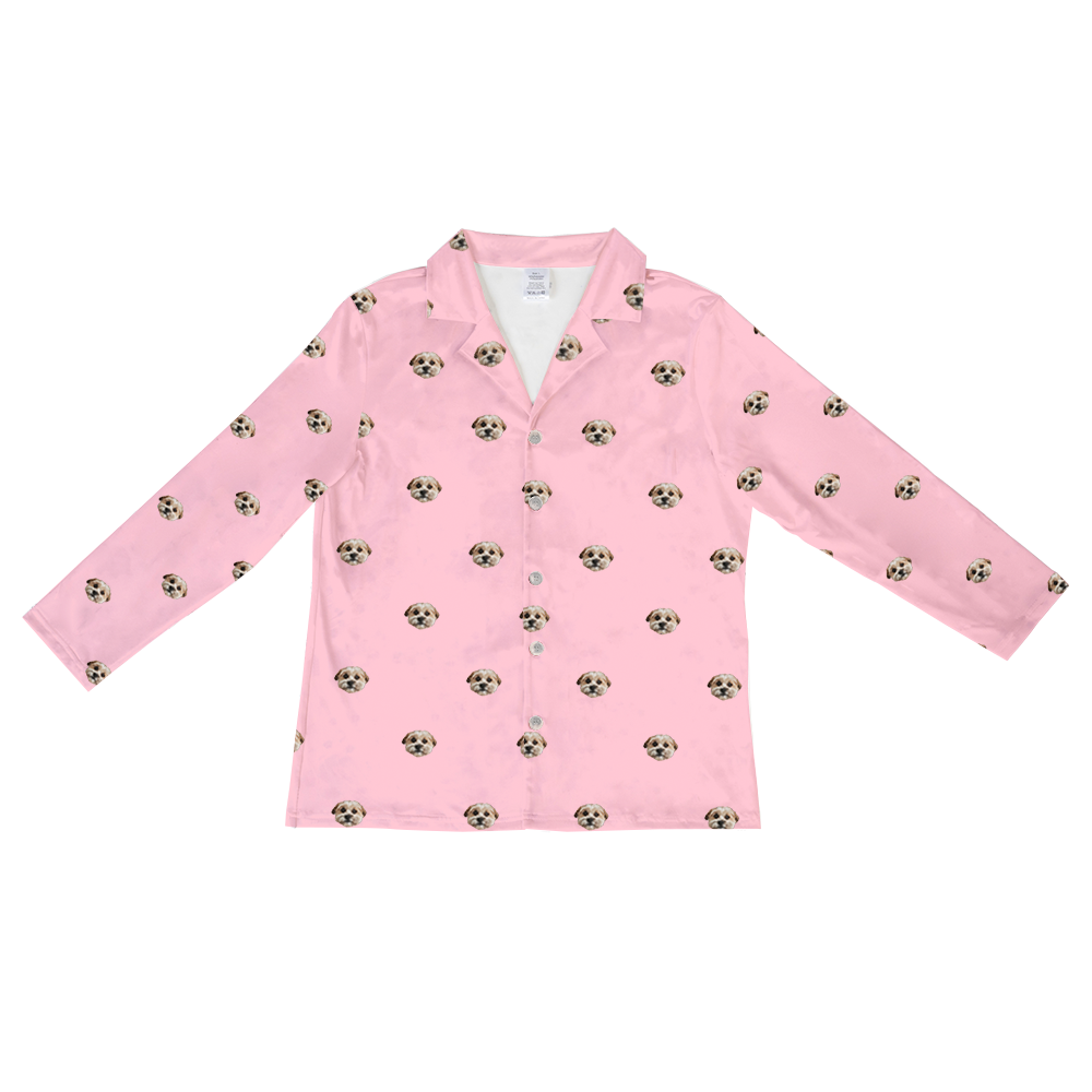 Light pink long-sleeve pajama top with a collar and buttons down the front, featuring an all-over repeating pattern of a small, light-colored dog's face with tan and brown markings.