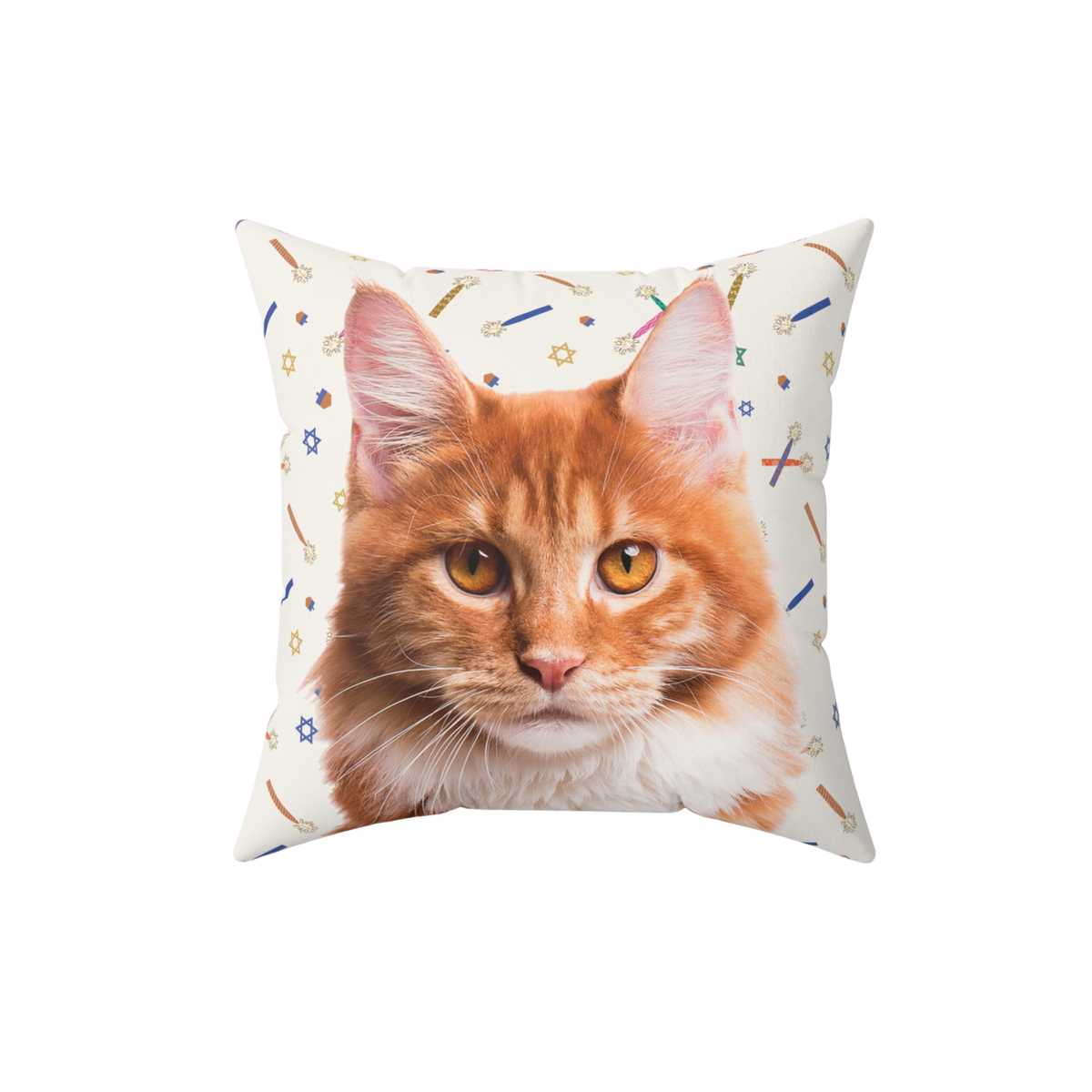 Square throw pillow featuring an illustrated orange tabby cat on a cream-colored background decorated with colorful Hanukkah-themed icons, including candles, stars, and sparkles.