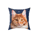 Blue pillow with Hannukah pattern, it features an illustration of a cat.