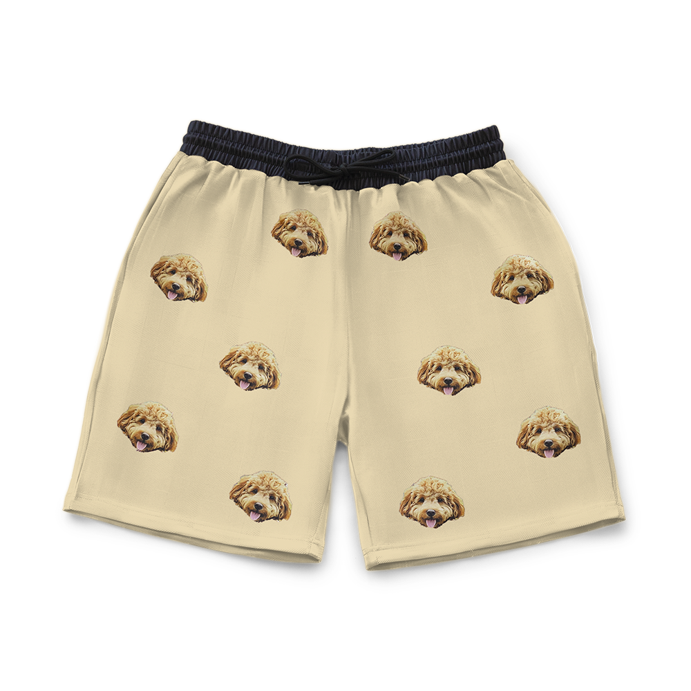 Yellow shorts with dog pattern on a white background