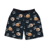 Black shorts with dog pattern on a white background