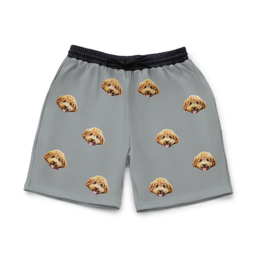 Gray shorts with dog pattern on a white background