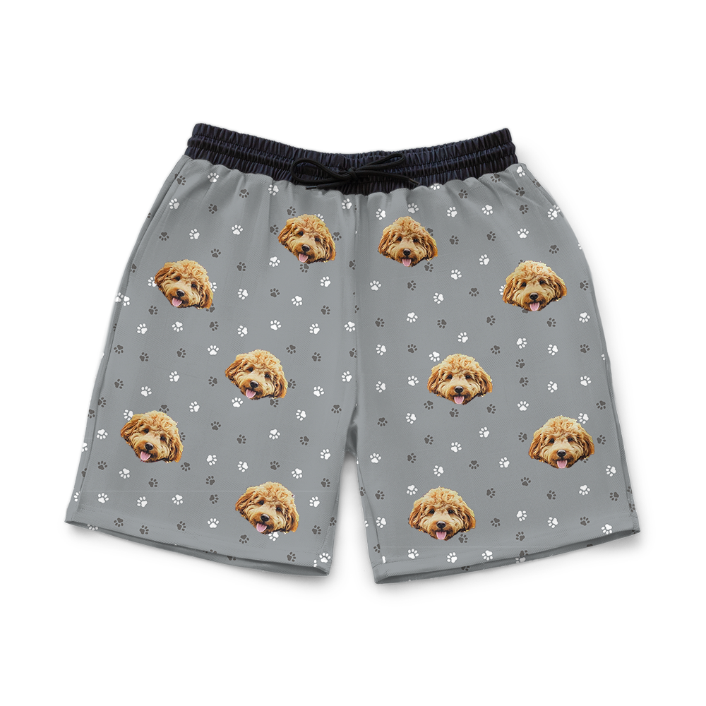 Gray shorts with dog pattern on a white background