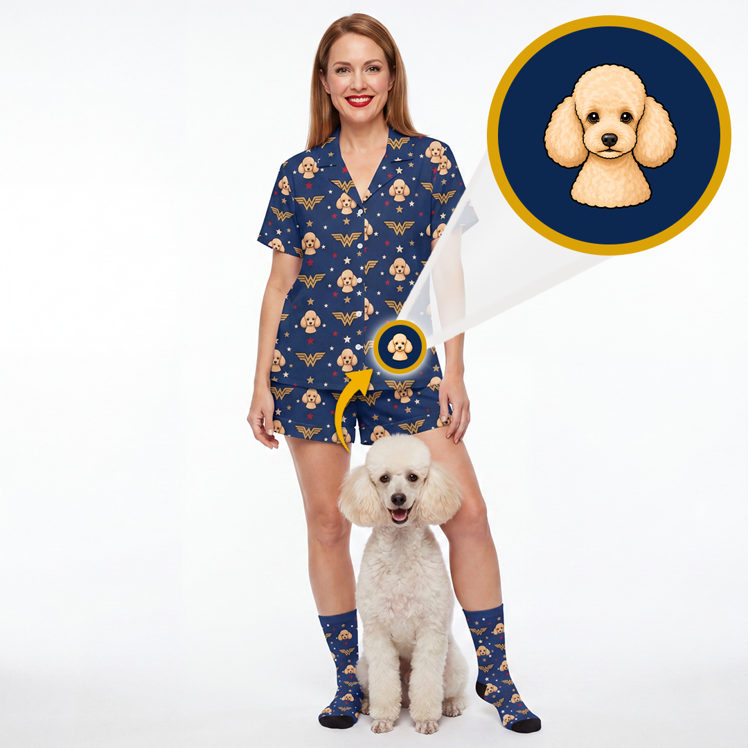 A woman modeling a navy blue short-sleeve scrub-style romper and matching socks with a dog print, standing next to a small white poodle. A circular inset shows a close-up of the dog face motif on the fabric.