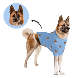A custom dog pajama with a printed pattern, featuring a dog in a blue color scheme.