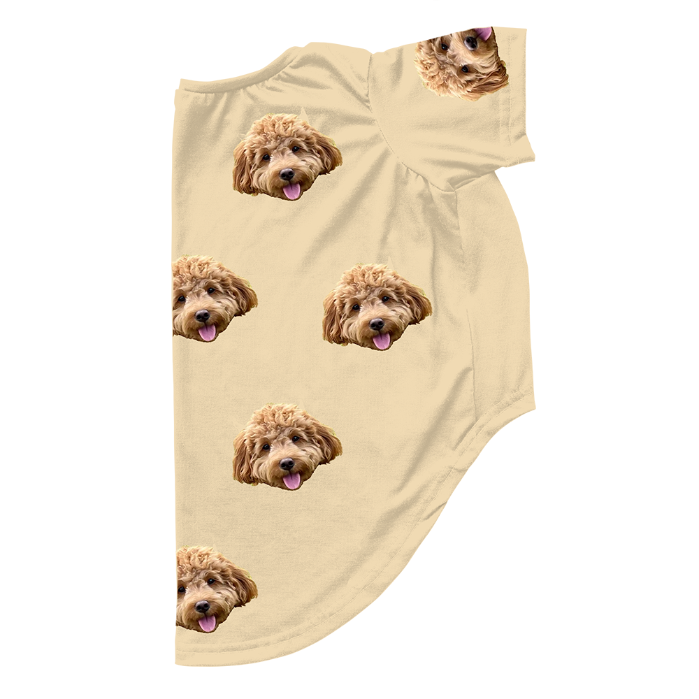 Yellow dog pajama with repeating pet faces on them