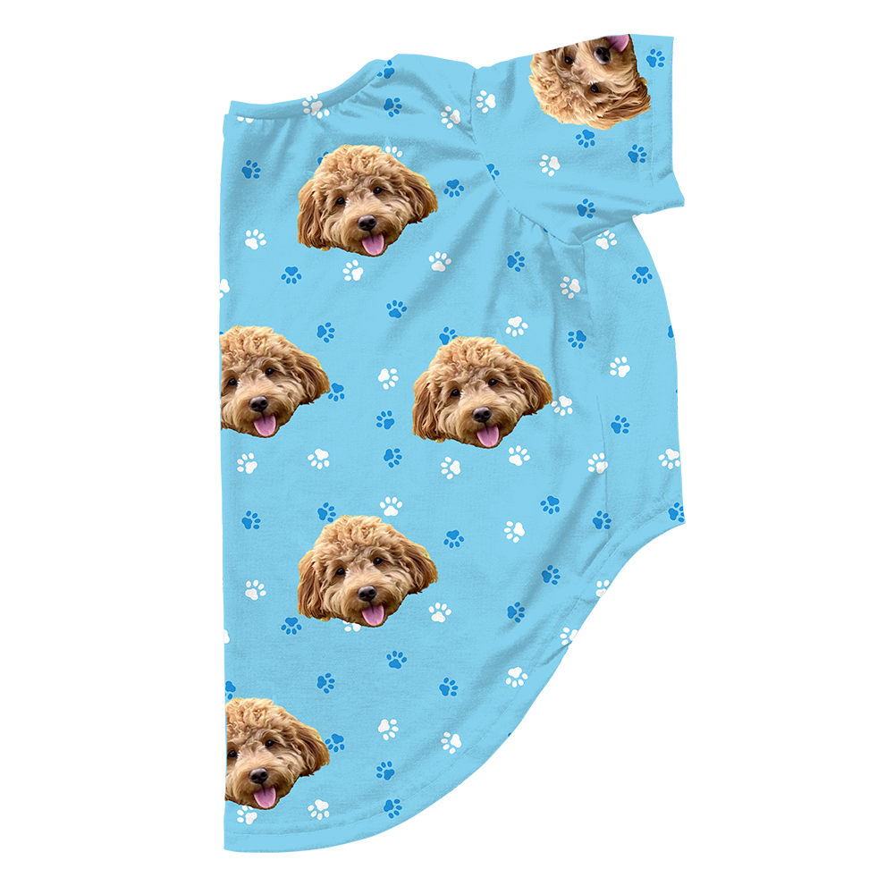 Light blue dog pajama with repeating pet faces on them[LightBluePaws]